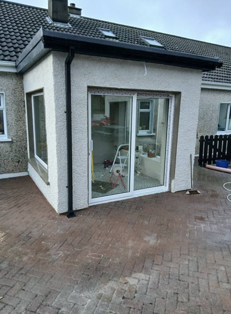 Finished home extension with patio doors